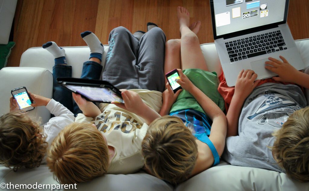 Kids engrossed in technology